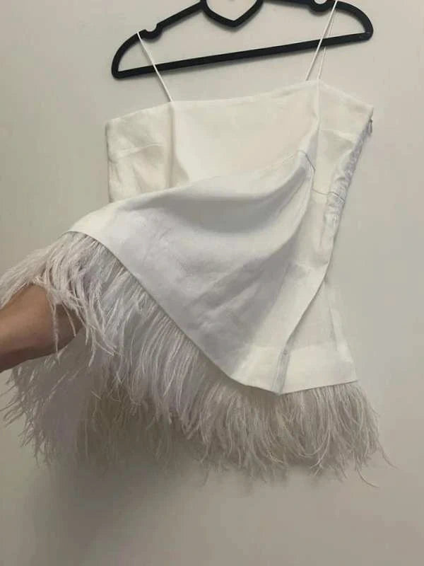 Naja Lauf white linen viscose top with ostrich feather
